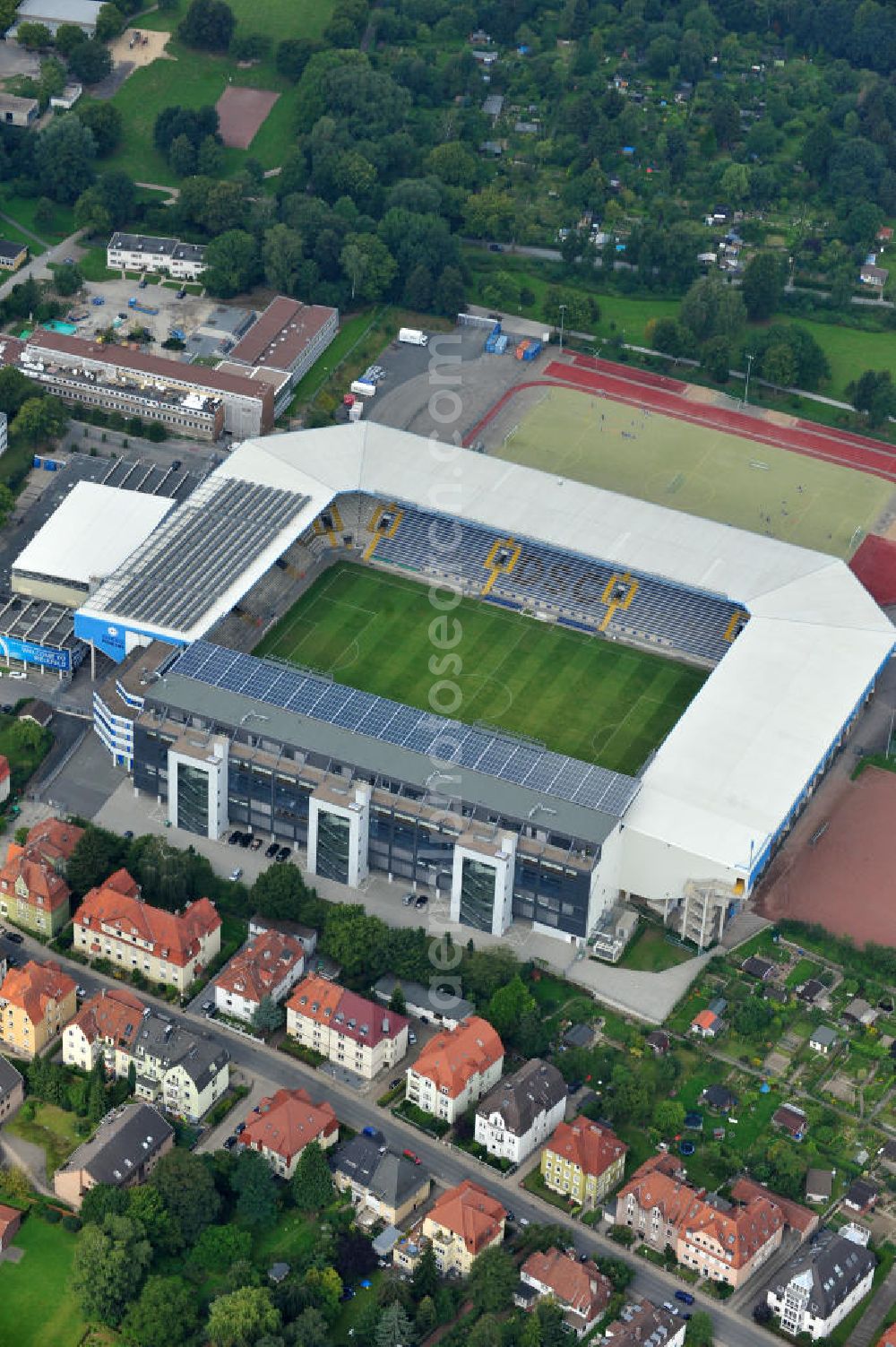 Aerial image Bielefeld - Die Schüco Arena, auch Bielefelder Alm oder Alm-Stadion genannt, im Grundbuch eingetragen als Stadion an der Melanchthonstraße, ist die Wettkampfstätte des Deutschen Sportclubs Arminia Bielefeld. Das Stadion an der Melanchthonstraße. The Schüco Arena / Stadium Bielefeld.