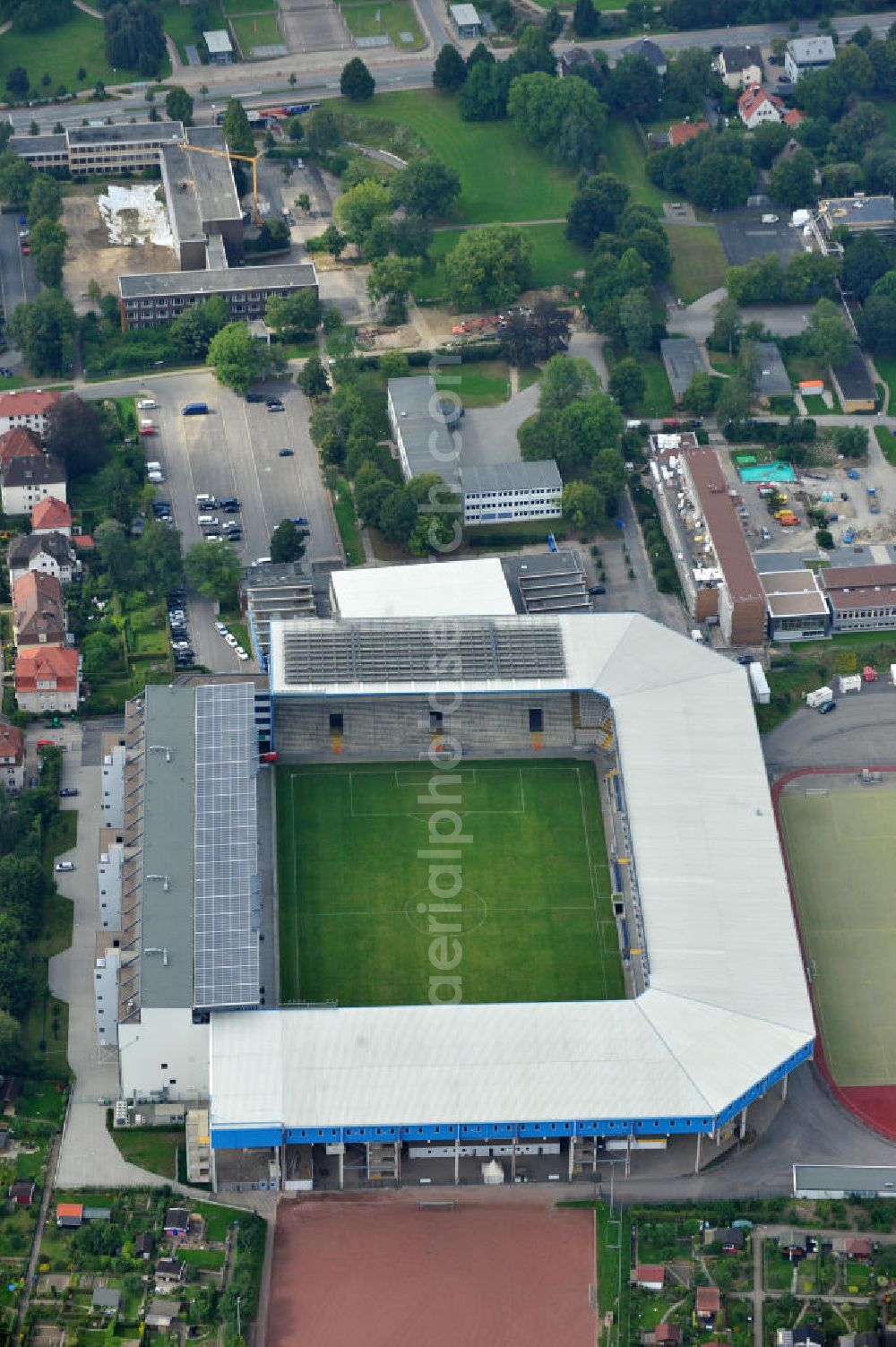 Bielefeld from above - Die Schüco Arena, auch Bielefelder Alm oder Alm-Stadion genannt, im Grundbuch eingetragen als Stadion an der Melanchthonstraße, ist die Wettkampfstätte des Deutschen Sportclubs Arminia Bielefeld. Das Stadion an der Melanchthonstraße. The Schüco Arena / Stadium Bielefeld.