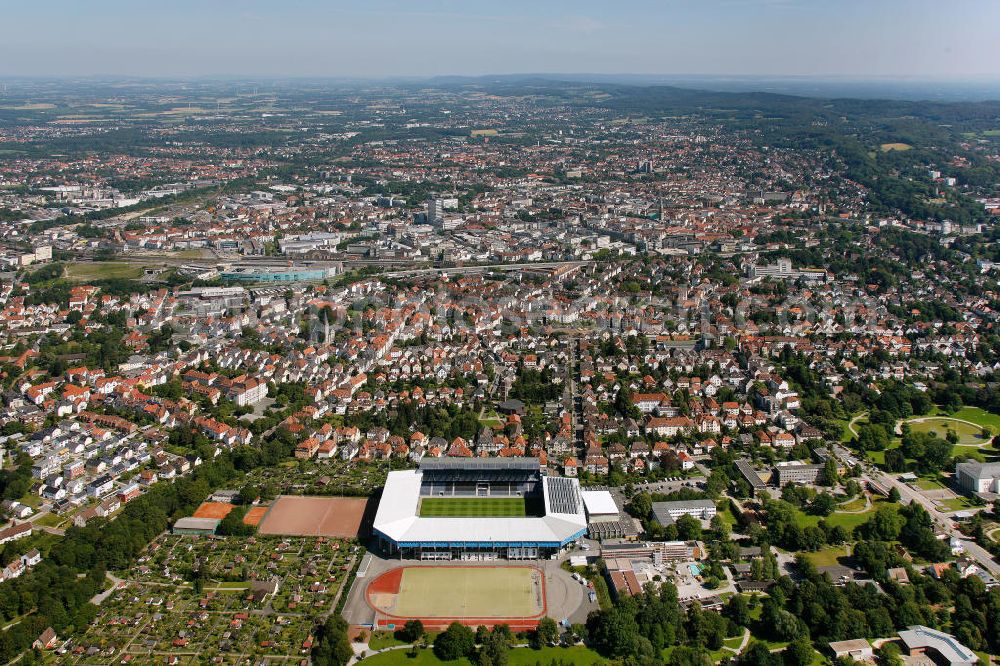 Aerial image Bielefeld - Die Schüco Arena, auch Bielefelder Alm oder Alm-Stadion genannt, im Grundbuch eingetragen als Stadion an der Melanchthonstraße, ist die Wettkampfstätte des Deutschen Sportclubs Arminia Bielefeld. Das Stadion an der Melanchthonstraße. The Schüco Arena / Stadium Bielefeld.