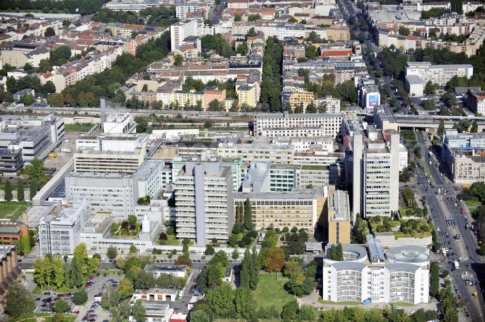 Berlin from above - Blick auf den Berliner Stadtteil Wedding mit dem Firmensitz der Bayer Schering Pharma an der Müllerstraße 185 und den S-Bahnhof Wedding. View to the Schering company headquarter and the railway station in the Berlin district Wedding.