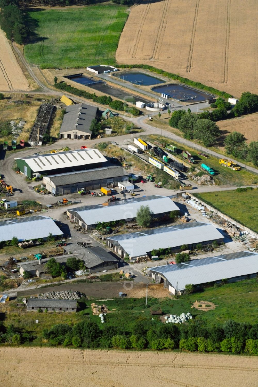 Mühlenberge from above - Barn building on the edge of agricultural fields and farmland in Muehlenberge in the state Brandenburg, Germany