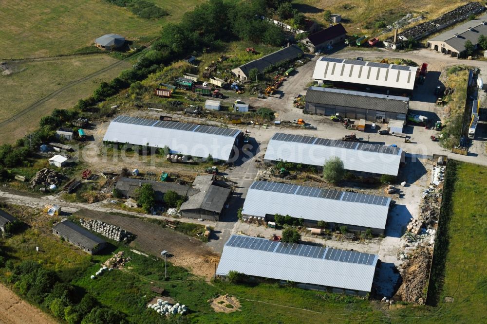 Mühlenberge from the bird's eye view: Barn building on the edge of agricultural fields and farmland in Muehlenberge in the state Brandenburg, Germany