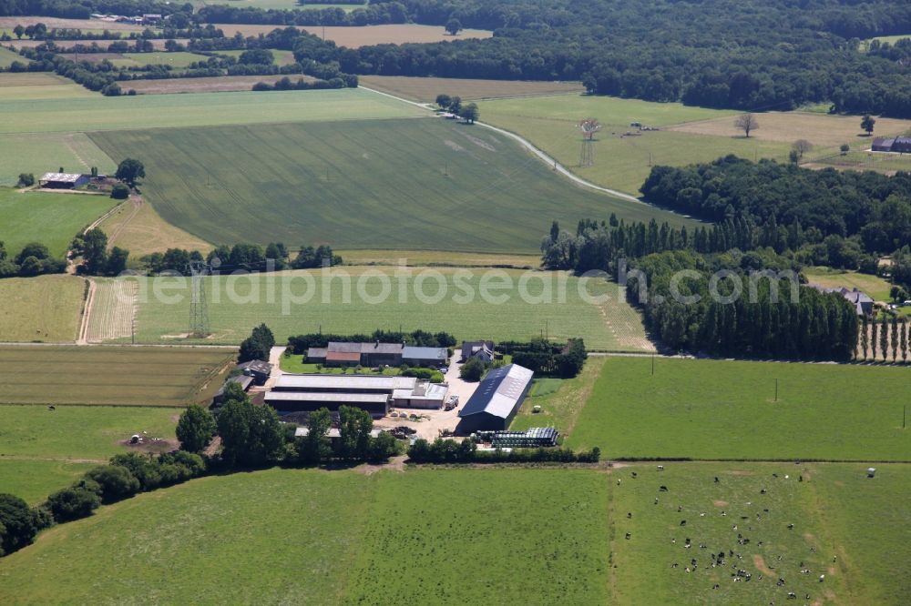 Aerial image Pleurtuit - Barn building on the edge of agricultural fields and farmland in Pleurtuit in Bretagne, France