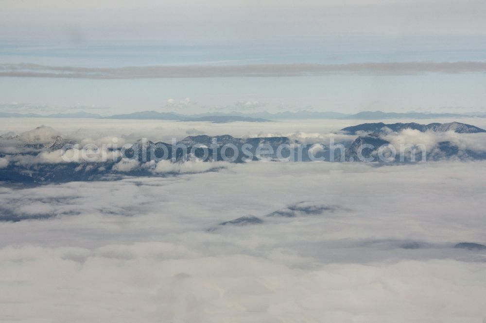 Aerial image Maribor - Sicht aus dem Cockpit eines Flugzeuges: Flug zwischen Schichtbewölkung durch Wolkenschichten wird der Blick auf das Alpenpanorama freigegeben.