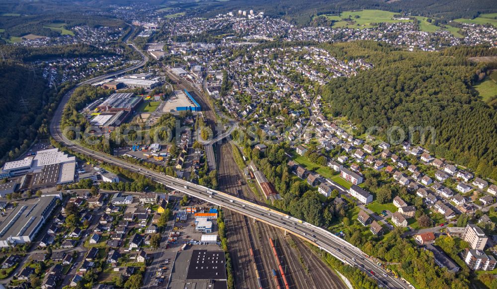 Aerial photograph Kreuztal - Railway track and overhead wiring harness in the route network of the Deutsche Bahn in the district Buchen on Huettentalstrasse in Kreuztal in the state North Rhine-Westphalia, Germany