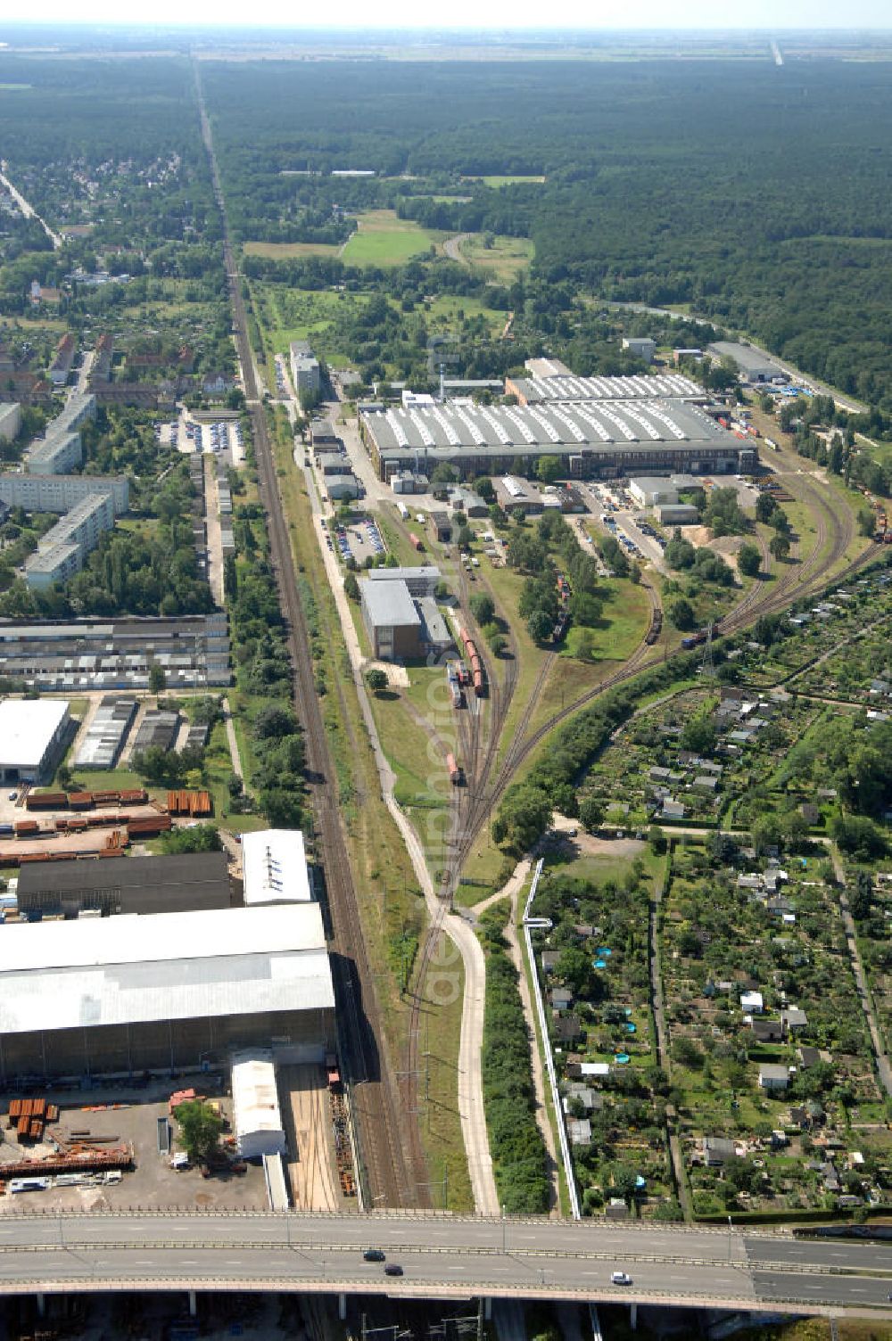 Dessau from above - Blick auf die Schienentrasse der Deutschen Bahn in Nord / Süd- Richtung von Dessau nach Wolfen / Bitterfeld