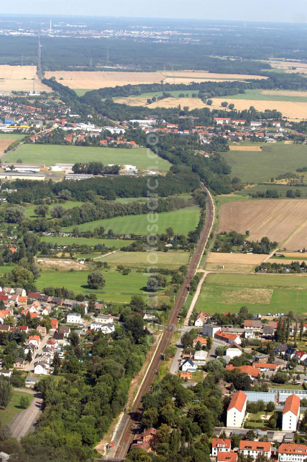 Wolfen from above - Blick auf die Schienentrasse der Deutschen Bahn in Nord / Süd- Richtung von Dessau kommend nach Wolfen-Bitterfeld