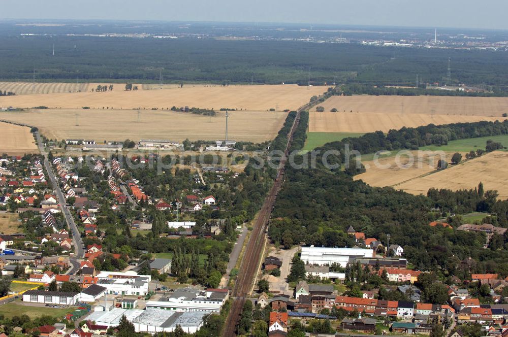 Wolfen from the bird's eye view: Blick auf die Schienentrasse der Deutschen Bahn in Nord / Süd- Richtung von Dessau kommend nach Wolfen-Bitterfeld