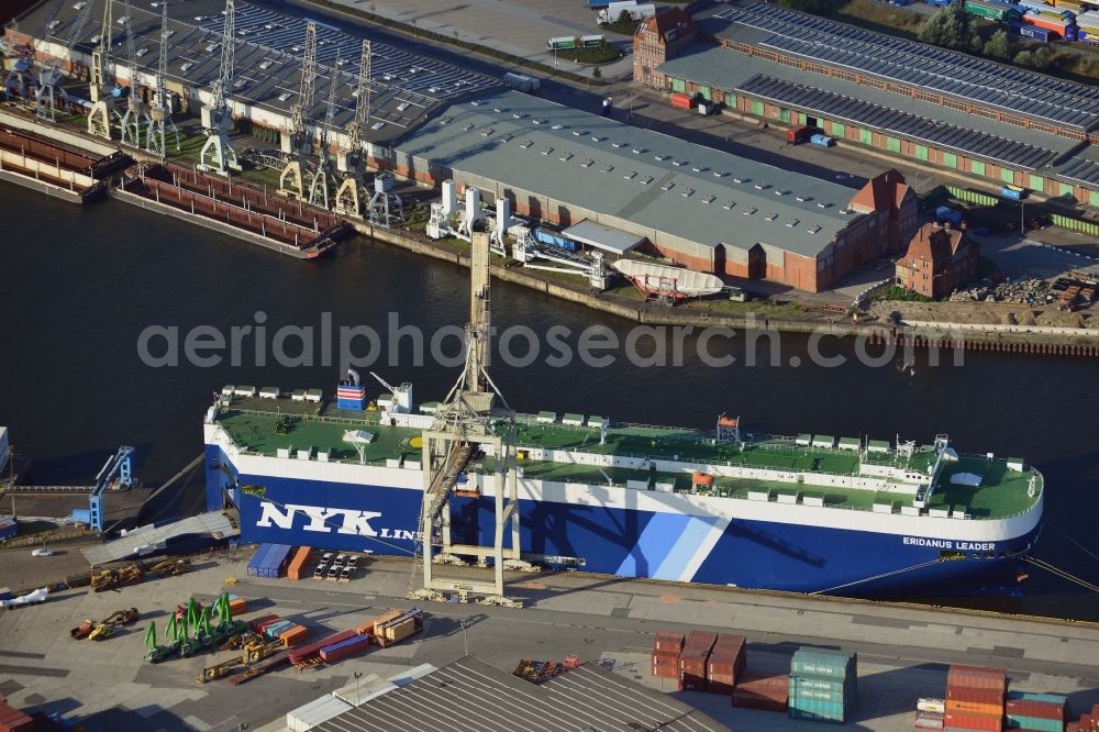 Hamburg from above - Eridanus Leader, a transport freighter for cars of the shipping company NYK Line, at the harbour installation O’Swaldka in the district Kleiner Grasbrook in the port of Hamburg