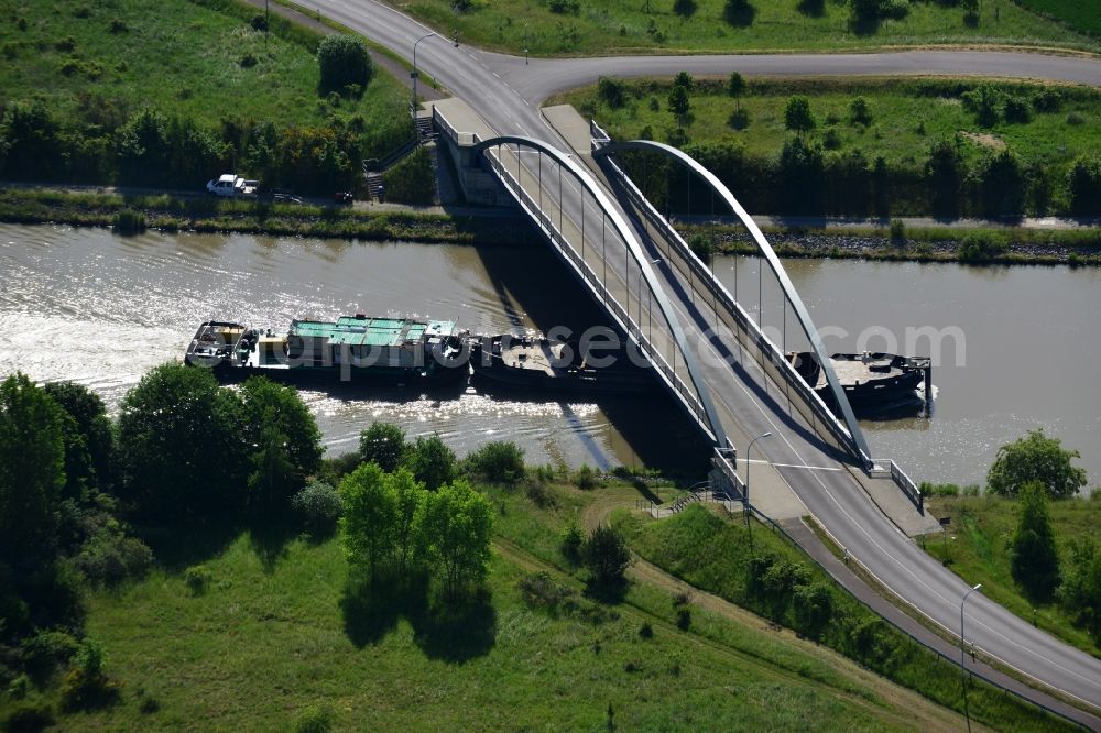 Elbe-Parey from above - Ships and barge trains inland waterway transport in driving on the waterway of the river the Elbe-Havel-Kanal in Elbe-Parey in the state Saxony-Anhalt