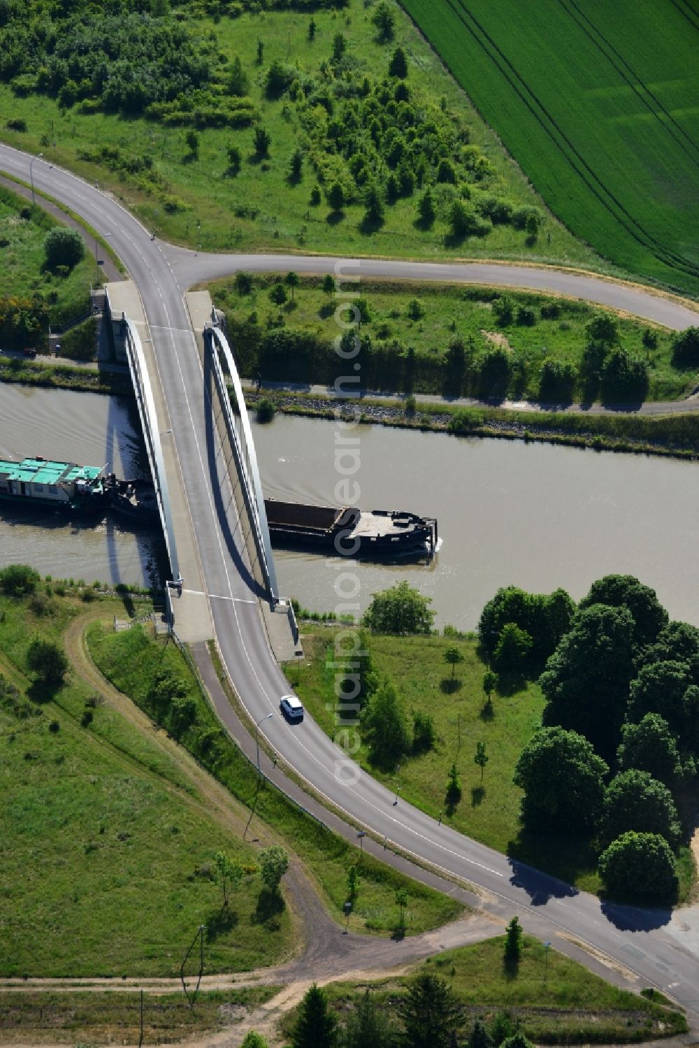 Aerial image Elbe-Parey - Ships and barge trains inland waterway transport in driving on the waterway of the river the Elbe-Havel-Kanal in Elbe-Parey in the state Saxony-Anhalt