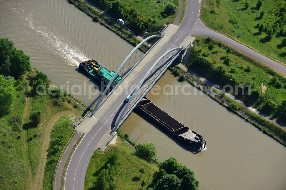 Elbe-Parey from above - Ships and barge trains inland waterway transport in driving on the waterway of the river the Elbe-Havel-Kanal in Elbe-Parey in the state Saxony-Anhalt