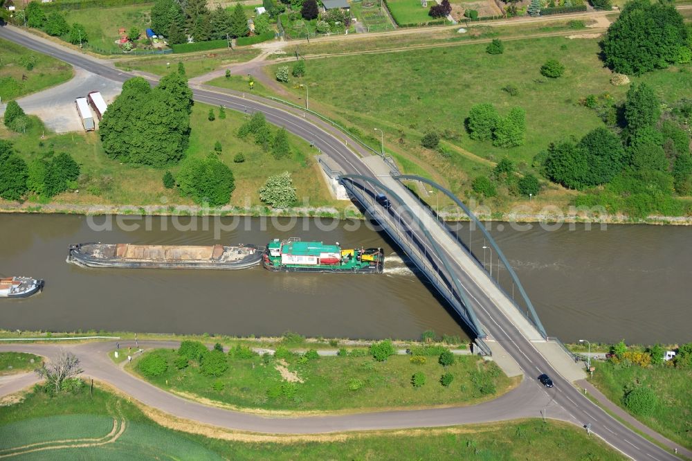 Elbe-Parey from above - Ships and barge trains inland waterway transport in driving on the waterway of the river the Elbe-Havel-Kanal in Elbe-Parey in the state Saxony-Anhalt