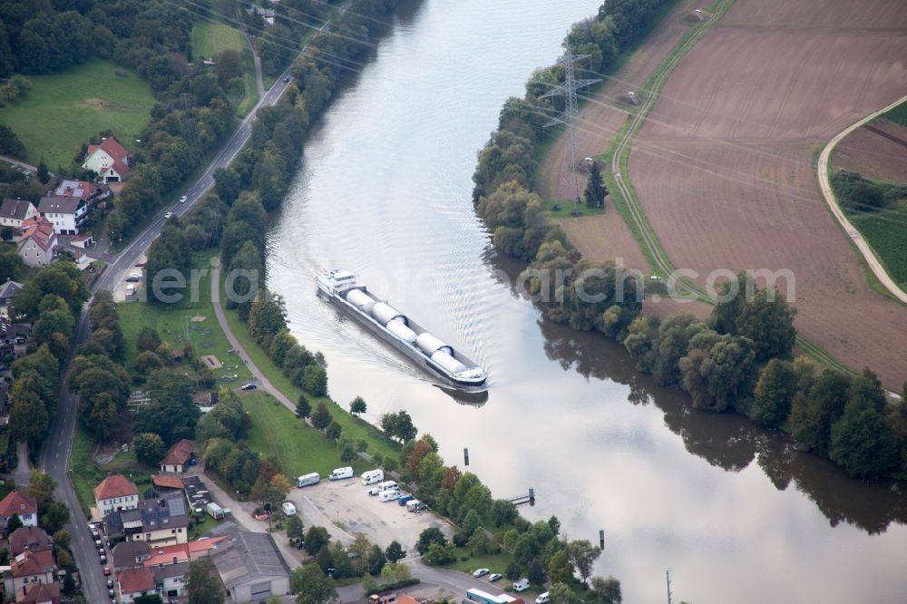 Eltmann from the bird's eye view: Ships and barge trains inland waterway transport in driving on the waterway of the river of the Main river in Eltmann in the state Bavaria