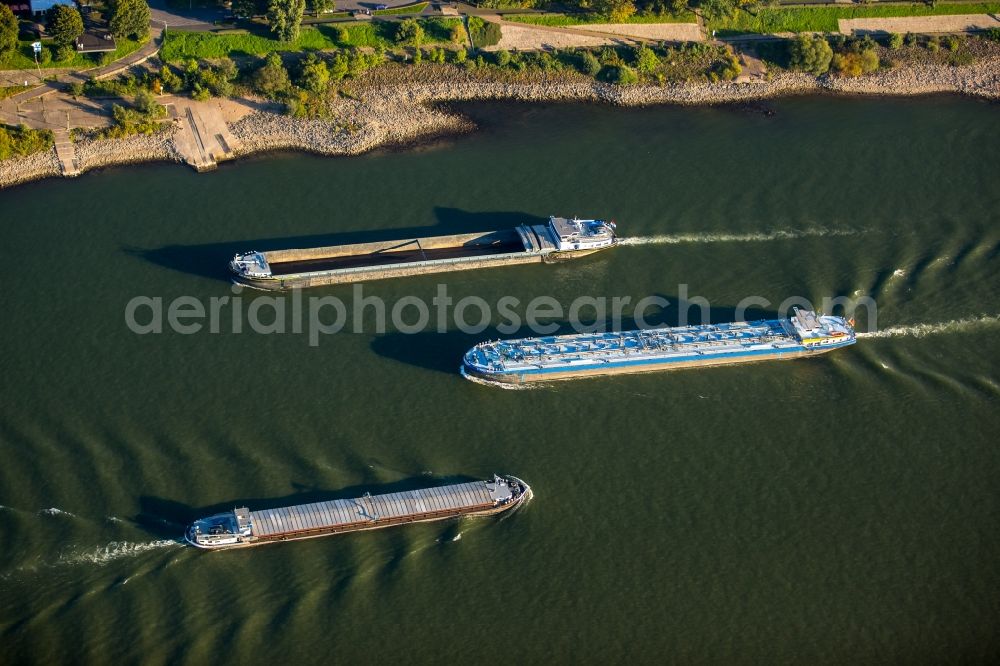 Aerial image Duisburg - Ships and barge trains inland waterway transport in driving on the waterway of the river of rhine in Duisburg in the state North Rhine-Westphalia