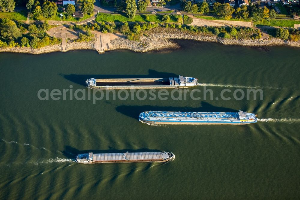 Duisburg from above - Ships and barge trains inland waterway transport in driving on the waterway of the river of rhine in Duisburg in the state North Rhine-Westphalia