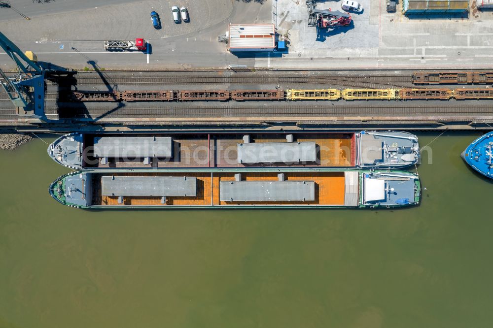 Köln from the bird's eye view: Ships and barge trains inland waterway transport in driving on the waterway of the river of the Rhine river on street Frankenwerft in the district Altstadt in Cologne in the state North Rhine-Westphalia, Germany