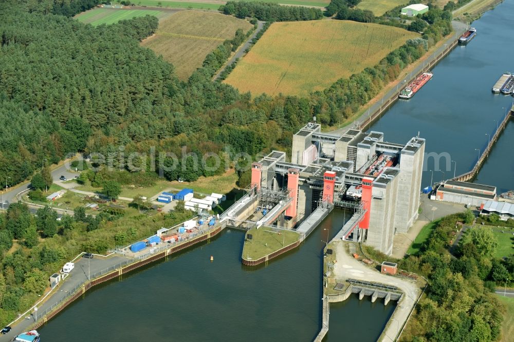 Scharnebeck from above - Boat lift and locks plants on the banks of the waterway of the Elbe-Seitenkanal in Scharnebeck in the state Lower Saxony, Germany