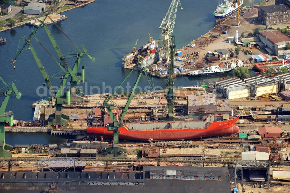 Danzig / Gdansk from above - Neubau vom Schiff Syn Antares im Trockendock der Werft Danzig AG im Hafen von Danzig-Schellmühl / Gdansk-Mlyniska in Pommern / Pomorskie, Polen. Newbuilding of the ship Syn Antares at a dry dock of the Gdansk shipyard at the port of Gdansk-Mlyniska in the Pomeranian Voivodeship / Pomorskie, Poland.