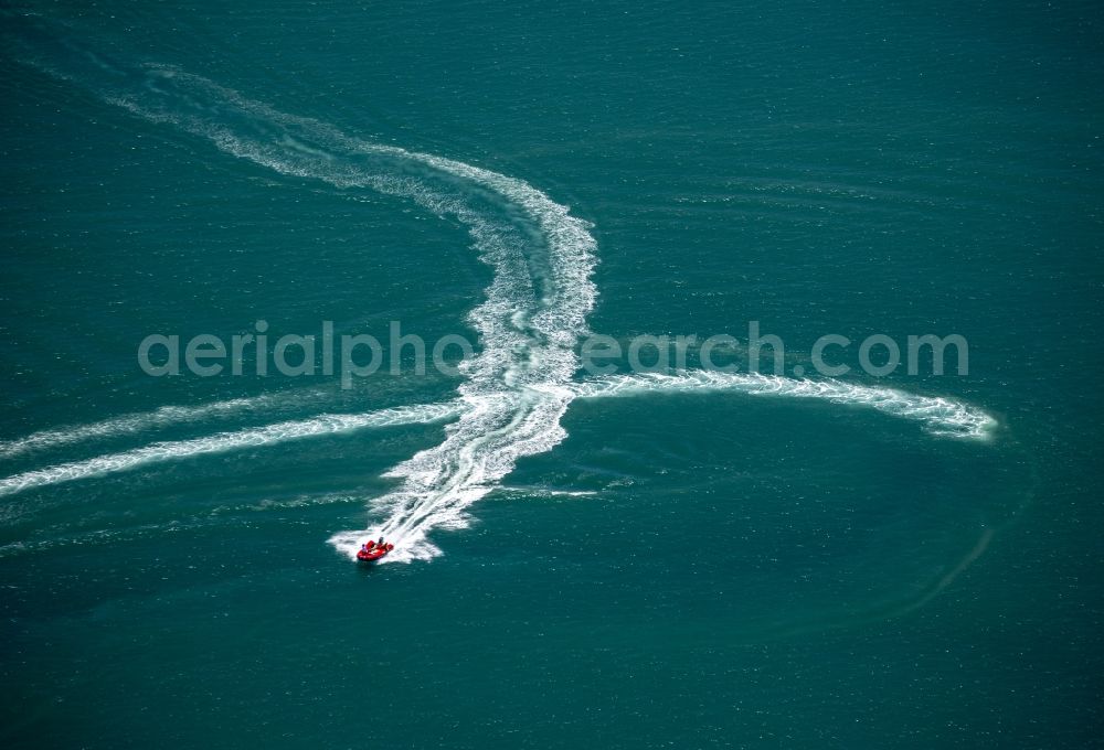 Saintes-Maries-de-la-Mer from above - Dinghy racing and recreational marine trips along the coast to the Mediterranean before Saintes-Maries-de-la-Mer in the province of Alpes-Cote d'Azur in France