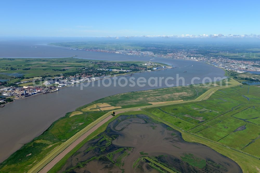 Aerial image Nordenham - Curved loop of the river Weser and its water mouth into North Sea near Bremerhaven in the state Bremen