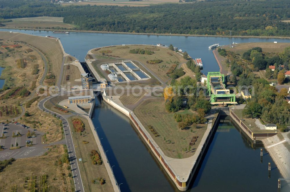 Rothensee from the bird's eye view: Die Sparschleuse Rothensee gehört zum Wasserstraßenkreuz Magdeburg, dass als Bestandteil der Verkehrsprojekte Deutsche Einheit Nr. 17 den Ausbau der Wasserstraßenverbindung Hannover- Magdeburg-Berlin beinhaltet. Die Schleuse Rothensee verbindet den Mittellandkanal mit den Magdeburger Häfen und der Elbe. Ein Projekt des WSV: Wasserstraßen-Neubauamt Magdeburg, 39106 Magdeburg, Tel. +49(0)391 535-0, email: wna-magdeburg@wsv.bund.de