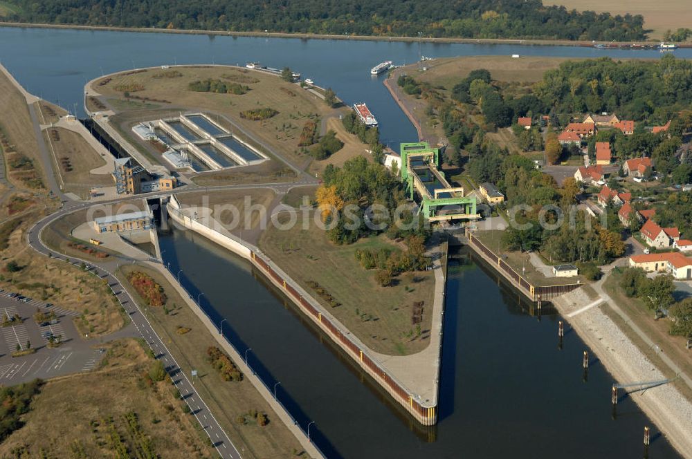 Aerial photograph Rothensee - Die Sparschleuse Rothensee gehört zum Wasserstraßenkreuz Magdeburg, dass als Bestandteil der Verkehrsprojekte Deutsche Einheit Nr. 17 den Ausbau der Wasserstraßenverbindung Hannover- Magdeburg-Berlin beinhaltet. Die Schleuse Rothensee verbindet den Mittellandkanal mit den Magdeburger Häfen und der Elbe. Ein Projekt des WSV: Wasserstraßen-Neubauamt Magdeburg, 39106 Magdeburg, Tel. +49(0)391 535-0, email: wna-magdeburg@wsv.bund.de