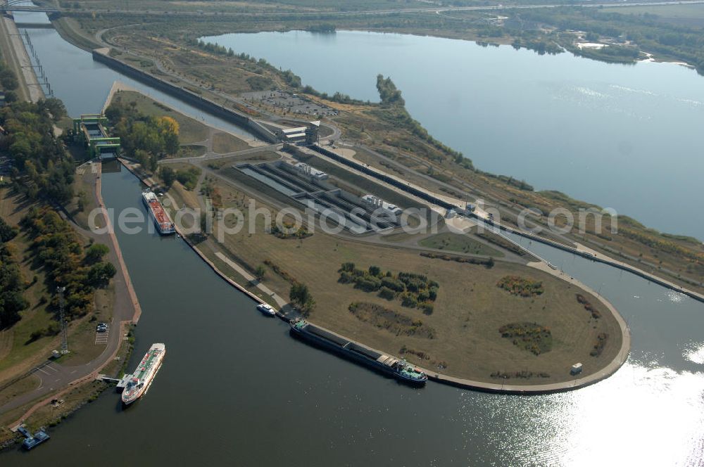 Aerial photograph Rothensee - Die Sparschleuse Rothensee gehört zum Wasserstraßenkreuz Magdeburg, dass als Bestandteil der Verkehrsprojekte Deutsche Einheit Nr. 17 den Ausbau der Wasserstraßenverbindung Hannover- Magdeburg-Berlin beinhaltet. Die Schleuse Rothensee verbindet den Mittellandkanal mit den Magdeburger Häfen und der Elbe. Ein Projekt des WSV: Wasserstraßen-Neubauamt Magdeburg, 39106 Magdeburg, Tel. +49(0)391 535-0, email: wna-magdeburg@wsv.bund.de