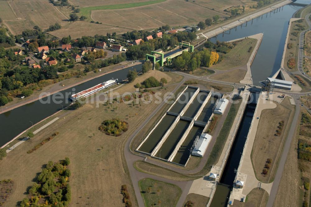 Aerial photograph Rothensee - Die Sparschleuse Rothensee gehört zum Wasserstraßenkreuz Magdeburg, dass als Bestandteil der Verkehrsprojekte Deutsche Einheit Nr. 17 den Ausbau der Wasserstraßenverbindung Hannover- Magdeburg-Berlin beinhaltet. Die Schleuse Rothensee verbindet den Mittellandkanal mit den Magdeburger Häfen und der Elbe. Ein Projekt des WSV: Wasserstraßen-Neubauamt Magdeburg, 39106 Magdeburg, Tel. +49(0)391 535-0, email: wna-magdeburg@wsv.bund.de