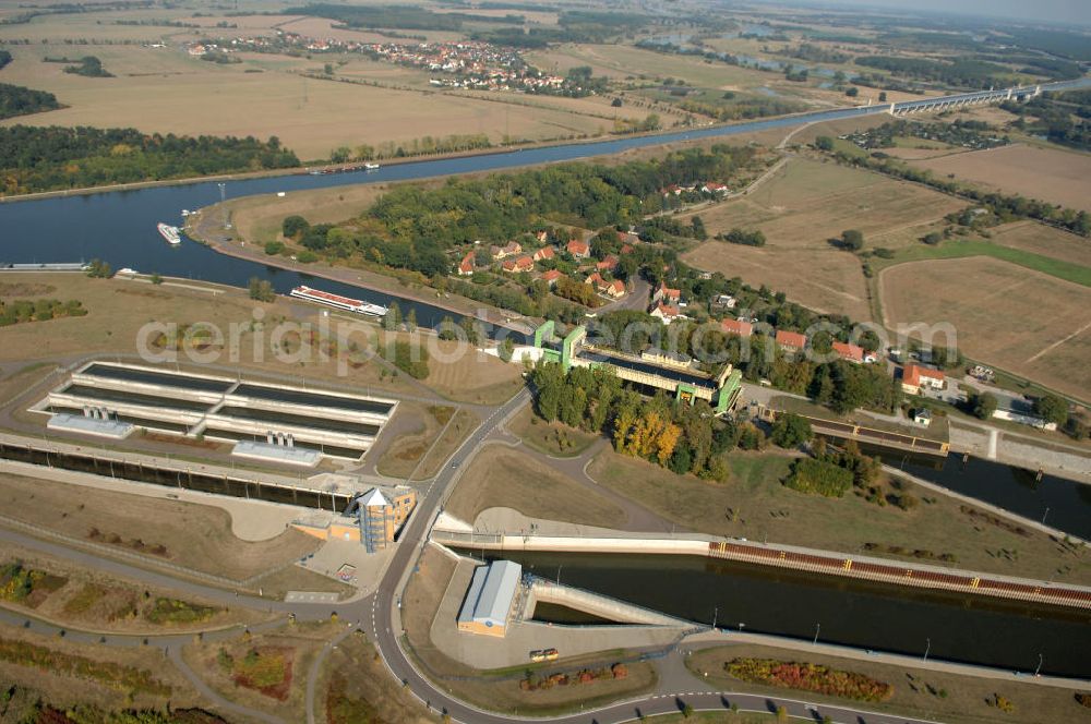 Rothensee from the bird's eye view: Die Sparschleuse Rothensee gehört zum Wasserstraßenkreuz Magdeburg, dass als Bestandteil der Verkehrsprojekte Deutsche Einheit Nr. 17 den Ausbau der Wasserstraßenverbindung Hannover- Magdeburg-Berlin beinhaltet. Die Schleuse Rothensee verbindet den Mittellandkanal mit den Magdeburger Häfen und der Elbe. Ein Projekt des WSV: Wasserstraßen-Neubauamt Magdeburg, 39106 Magdeburg, Tel. +49(0)391 535-0, email: wna-magdeburg@wsv.bund.de