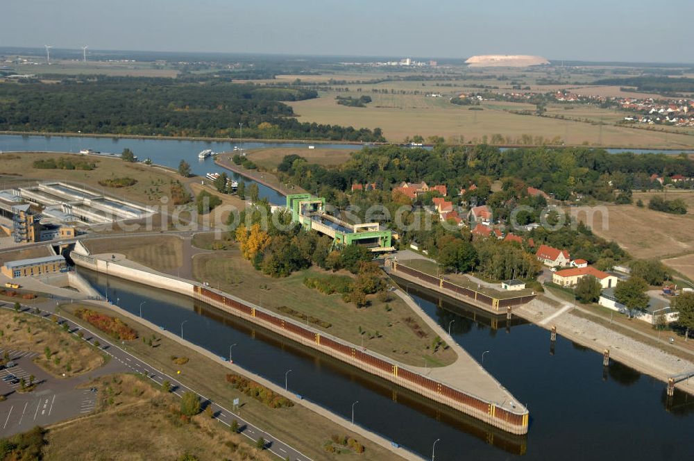 Aerial photograph Rothensee - Die Sparschleuse Rothensee gehört zum Wasserstraßenkreuz Magdeburg, dass als Bestandteil der Verkehrsprojekte Deutsche Einheit Nr. 17 den Ausbau der Wasserstraßenverbindung Hannover- Magdeburg-Berlin beinhaltet. Die Schleuse Rothensee verbindet den Mittellandkanal mit den Magdeburger Häfen und der Elbe. Ein Projekt des WSV: Wasserstraßen-Neubauamt Magdeburg, 39106 Magdeburg, Tel. +49(0)391 535-0, email: wna-magdeburg@wsv.bund.de