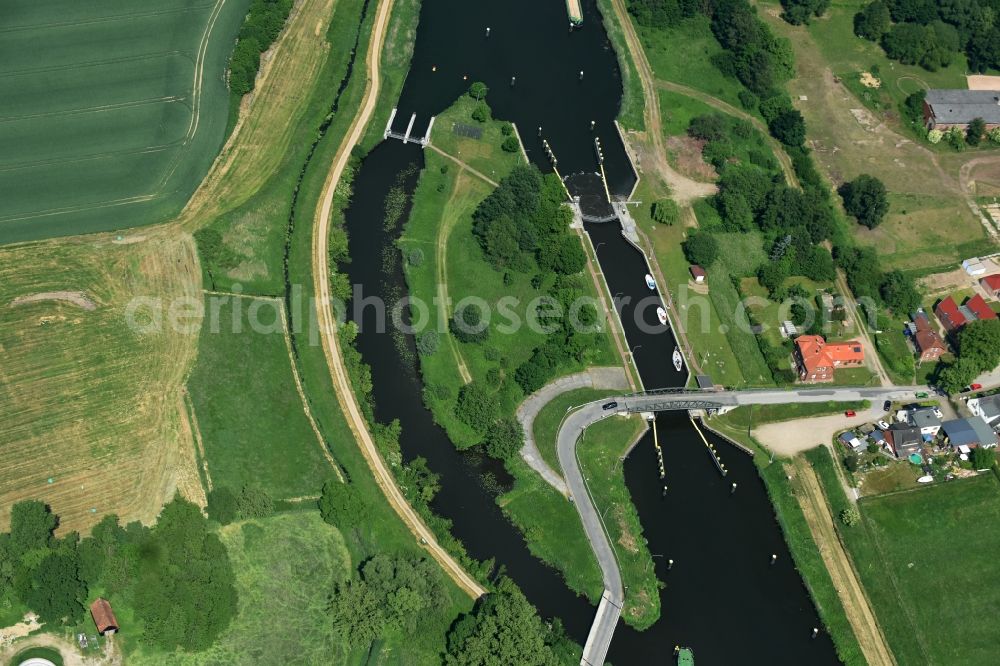 Aerial image Lübeck - Lock with sluice bridge Buessau at the riverside of the Elbe-Luebeck-Canal in Luebeck in the state Schleswig-Holstein