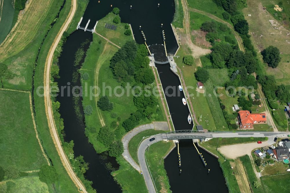 Aerial photograph Lübeck - Lock with sluice bridge Buessau at the riverside of the Elbe-Luebeck-Canal in Luebeck in the state Schleswig-Holstein