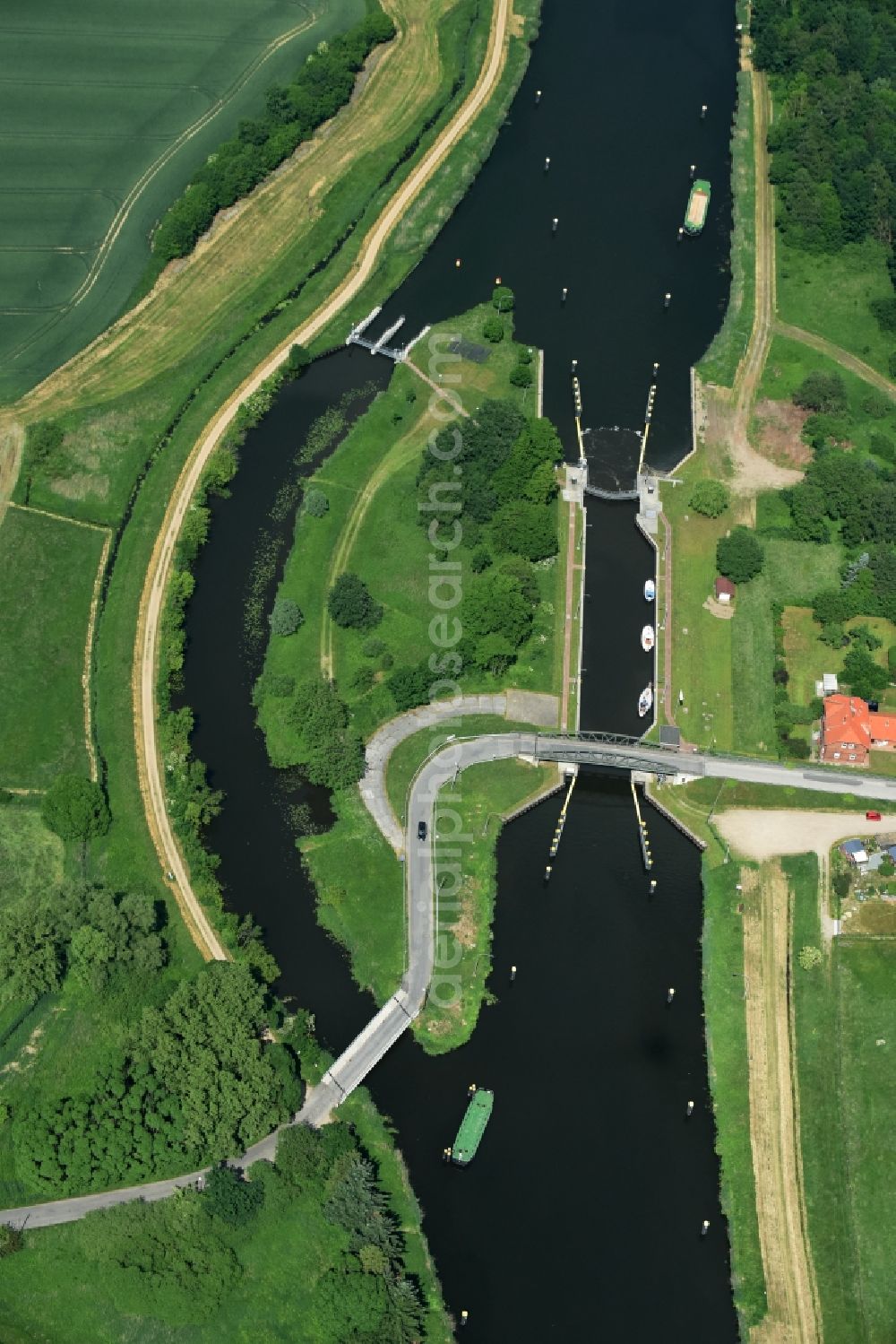 Lübeck from above - Lock with sluice bridge Buessau at the riverside of the Elbe-Luebeck-Canal in Luebeck in the state Schleswig-Holstein