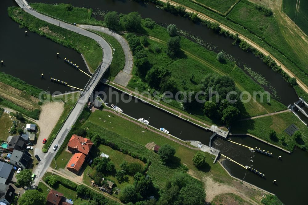 Aerial photograph Lübeck - Lock with sluice bridge Buessau at the riverside of the Elbe-Luebeck-Canal in Luebeck in the state Schleswig-Holstein