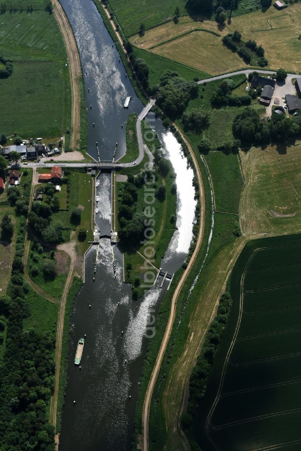 Lübeck from above - Lock with sluice bridge Buessau at the riverside of the Elbe-Luebeck-Canal in Luebeck in the state Schleswig-Holstein