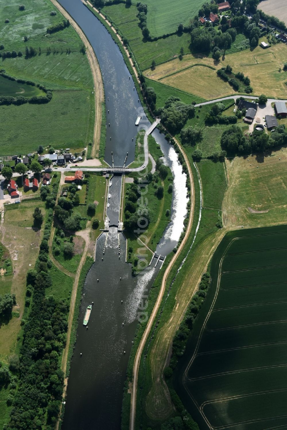 Lübeck from the bird's eye view: Lock with sluice bridge Buessau at the riverside of the Elbe-Luebeck-Canal in Luebeck in the state Schleswig-Holstein