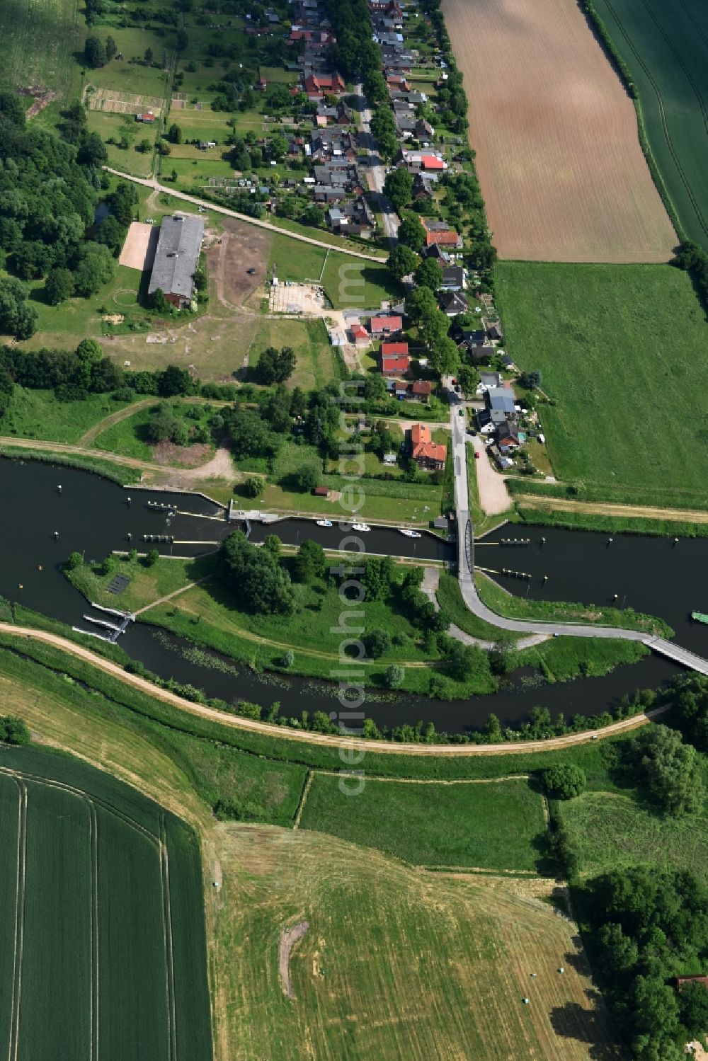 Lübeck from the bird's eye view: Lock with sluice bridge Buessau at the riverside of the Elbe-Luebeck-Canal in Luebeck in the state Schleswig-Holstein