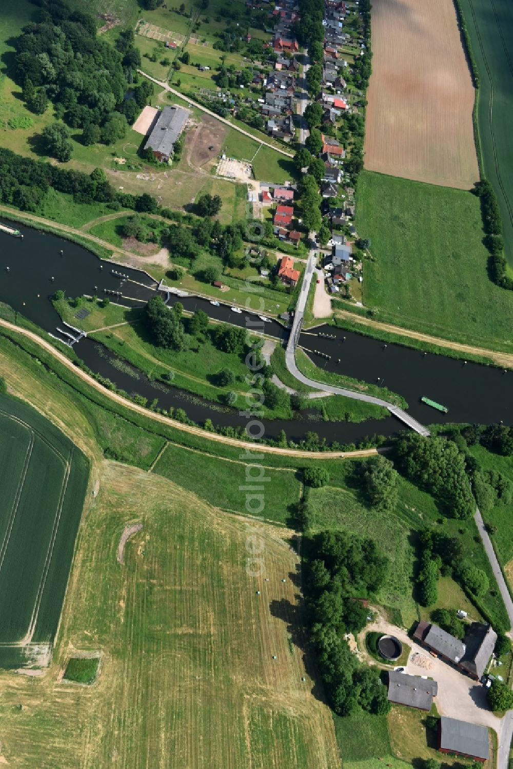 Aerial image Lübeck - Lock with sluice bridge Buessau at the riverside of the Elbe-Luebeck-Canal in Luebeck in the state Schleswig-Holstein