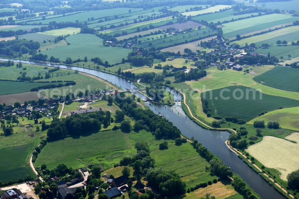 Aerial photograph Lübeck - Lock with sluice bridge Buessau at the riverside of the Elbe-Luebeck-Canal in Luebeck in the state Schleswig-Holstein