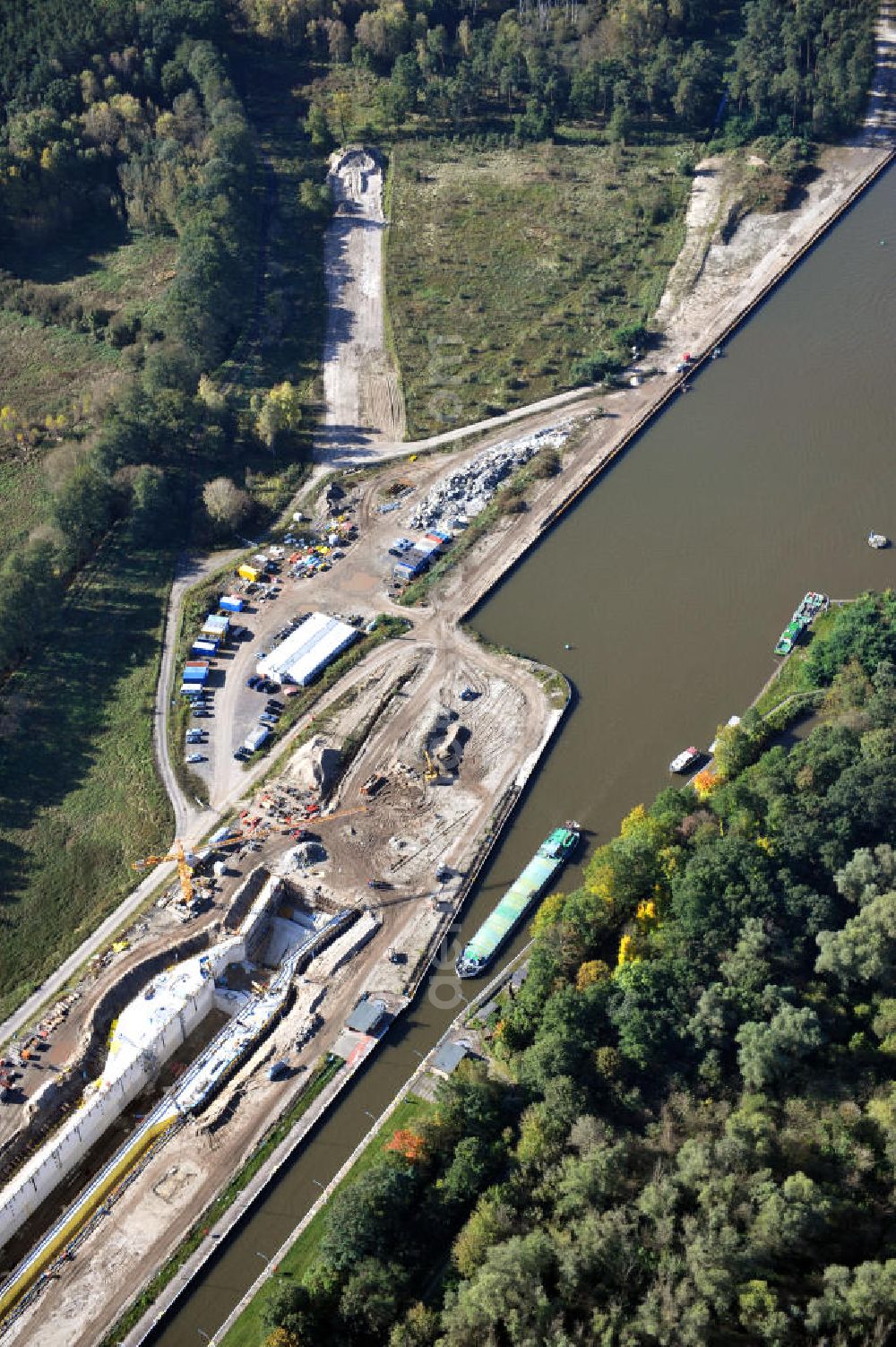 Wusterwitz from the bird's eye view: Blick auf die Erweiterungsbaustelle der Schleuse Wusterwitz am Elbe-Havel-Kanal. Ein Projekt des WSV, Wasser- und Schifffahrtsverwaltung des Bundes. View of the construction site of the expansion lock Wusterwitz.