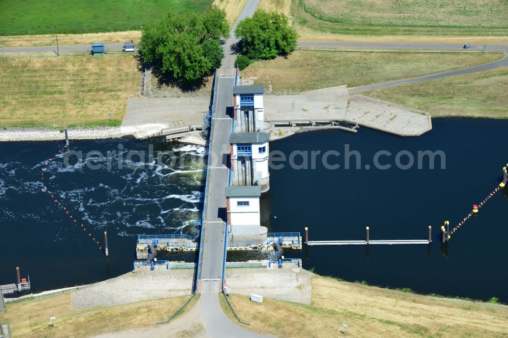 Aerial image Gnevsdorf - Locks - plants on the banks of the waterway Gnevsdorfer Vorfluter in Gnevsdorf in the state Brandenburg