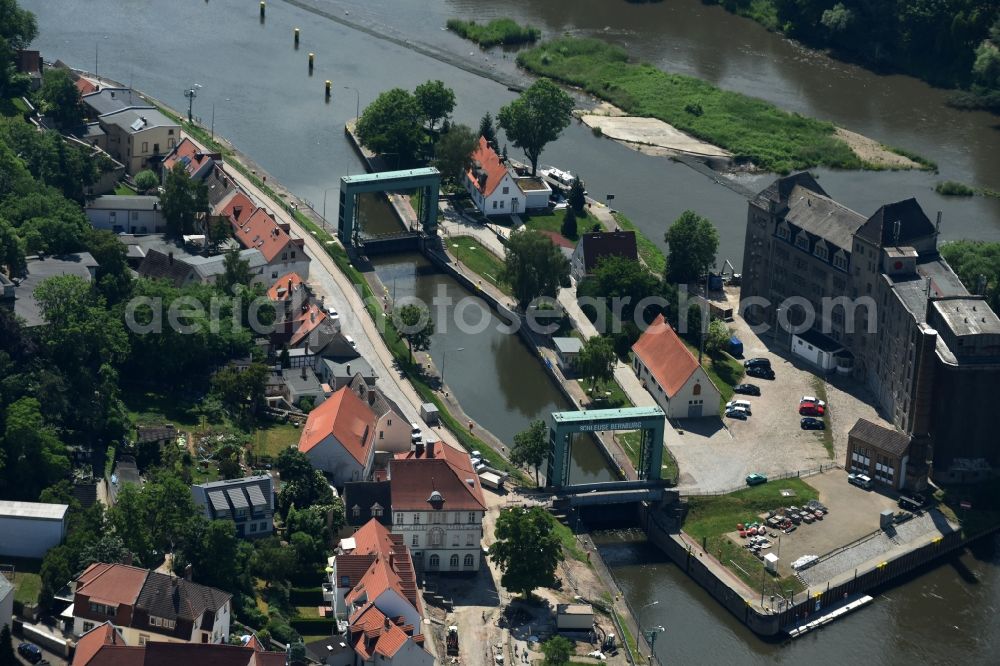 Bernburg (Saale) from above - Locks - plants on the banks of the waterway of the river Saale in Bernburg (Saale) in the state Saxony-Anhalt