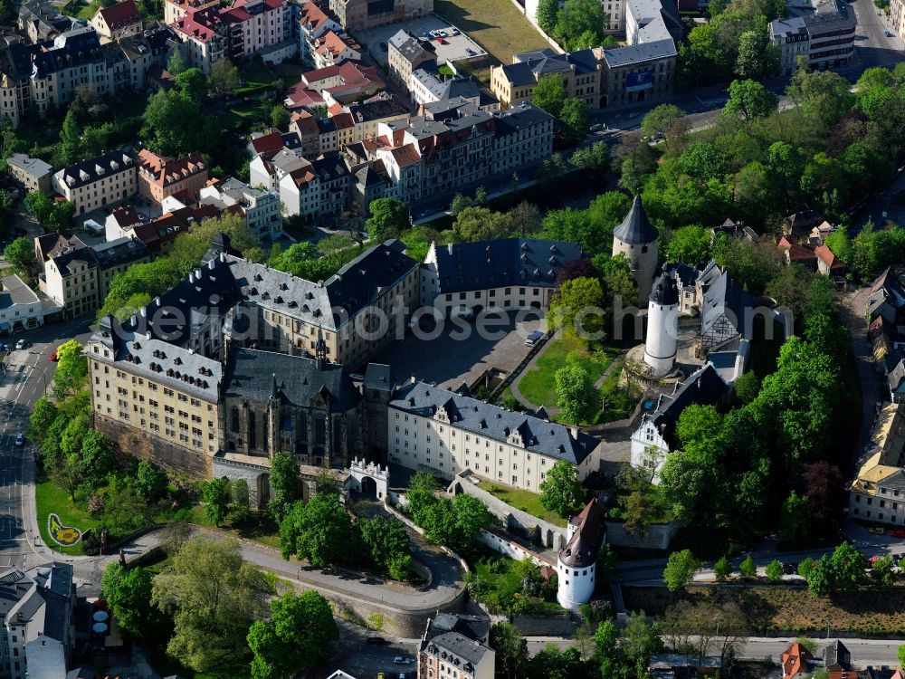 Altenburg from above - View of the castle of Altenburg, a former residence of the Dukes of Saxe-Altenburg. It is located in the center of Altenburg in Thuringia and the castle houses and Playing Cards Museum