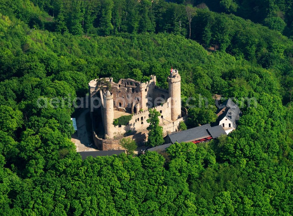 Bensheim from the bird's eye view: Castle Auerbach in the town of Bensheim in the state of Hesse. The castle is listed as a protected building and is actually the ruin of a medieval stronghold. It is located on the Auerberg mountain. It was built in the 13th century and was partly destroyed in the 17th century. Since then it is in the shape of today's ruins. There is a restaurant on site