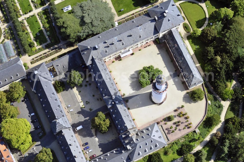 Aerial image Bad Homburg - Schloss Bad Homburg in Homburg, Hessen. Das ehemalige Domizil der Landgrafen von Hessen-Homburg und spätere Sommerresidenz der preußischen Könige und deutschen Kaiser wurde im späten 17. Jahrhundert erbaut. Das markanteste Merkmal ist der aus dem 14. Jahrhundert stammende weiße Bergfried, der die Anlage überragt. Das Schloss ist unter der Verwaltung der Staatlichen Schlösser und Gärten in Hessen. Castle Bad Homburg in Homburg, Hesse. The former domicile of the landgraves of Hesse-Homburg and later the prussian kings and german emperors summer residence has been built in the late seventeenth century. Striking is the white keep, it dates back to the fourteenth century. The castle is under administration of the national castles and gardens in Hesse.