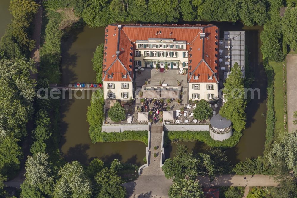 Gelsenkirchen from above - 09/06/2012 GELSENKIRCHEN castle overlooking mountains in the Buer district of Gelsenkirchen, North Rhine-Westphalia. It was built as a fortress to protect the water today in Gelsenkirchen district alder and to 1433 was the family seat of the mountains. In the first half of the 16th Century, rebuilt into a castle and in the last quarter of the 18th Century changed again, to the mansion of the system presented in the style of late baroque to classicism at the threshold. It is now used as a hotel-restaurant