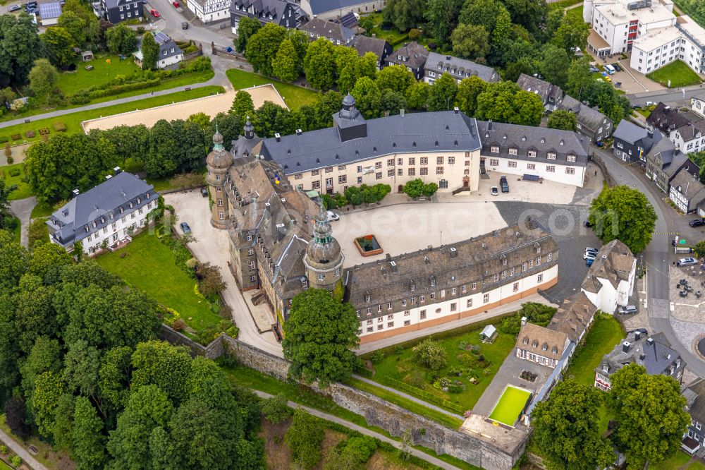 Aerial image Bad Berleburg - castle Berleburg in Bad Berleburg in the county district Siegen-Wittgenstein in the state of North Rhine-Westphali. The castle is now owned by the family Sayn-Wittgenstein-Berleburg and is used as a museum