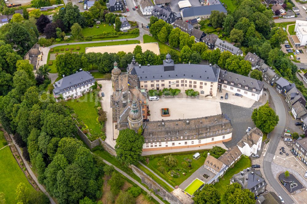 Aerial photograph Bad Berleburg - castle Berleburg in Bad Berleburg in the county district Siegen-Wittgenstein in the state of North Rhine-Westphali. The castle is now owned by the family Sayn-Wittgenstein-Berleburg and is used as a museum