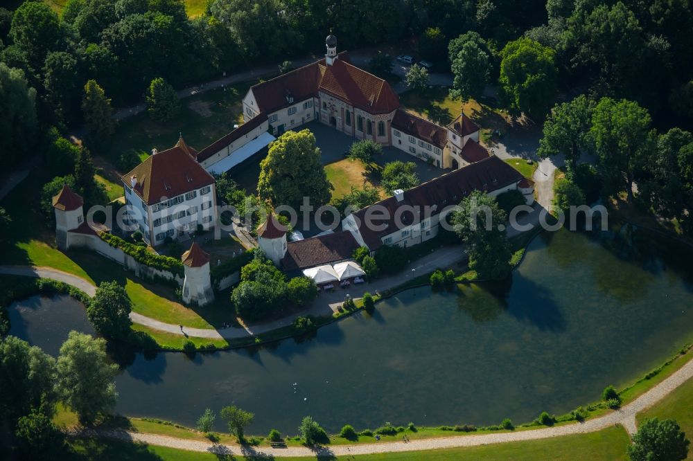 München from above - Blutenburg Castle in Munich in the state of Bavaria. The former hunting castle is located in the Western city part of Obermenzing. Today it contains the International Youth Library and various museums. The courtyard is enclosed by several towers